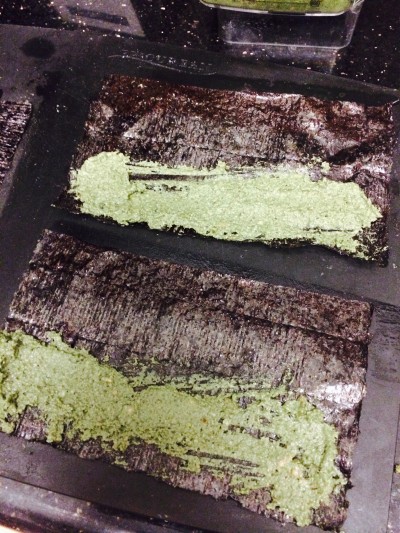 Place a teaspoon of mixture on one side of the sheet and spread from edge to edge.