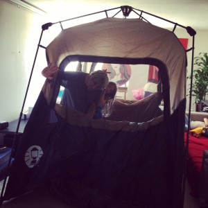 Prepping for our Family camp trip. Even our kids can set this tent up.